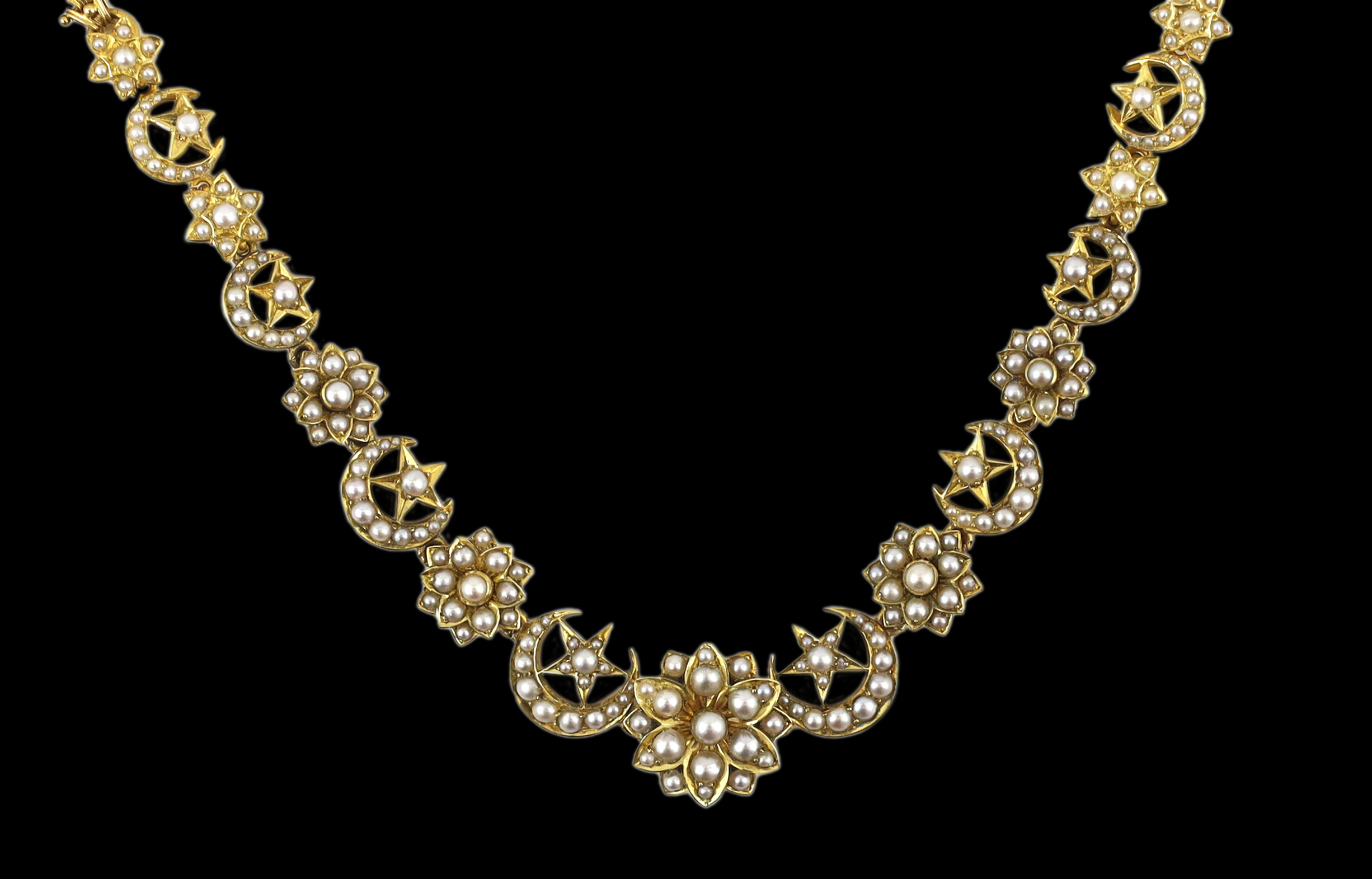 A late Victorian gold and seed pearl set necklace